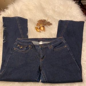 Dark denim jeans with flare leg bottom. Size 10